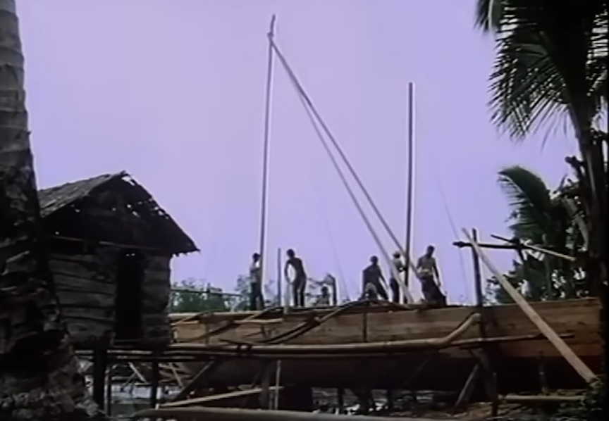 People building a small boat