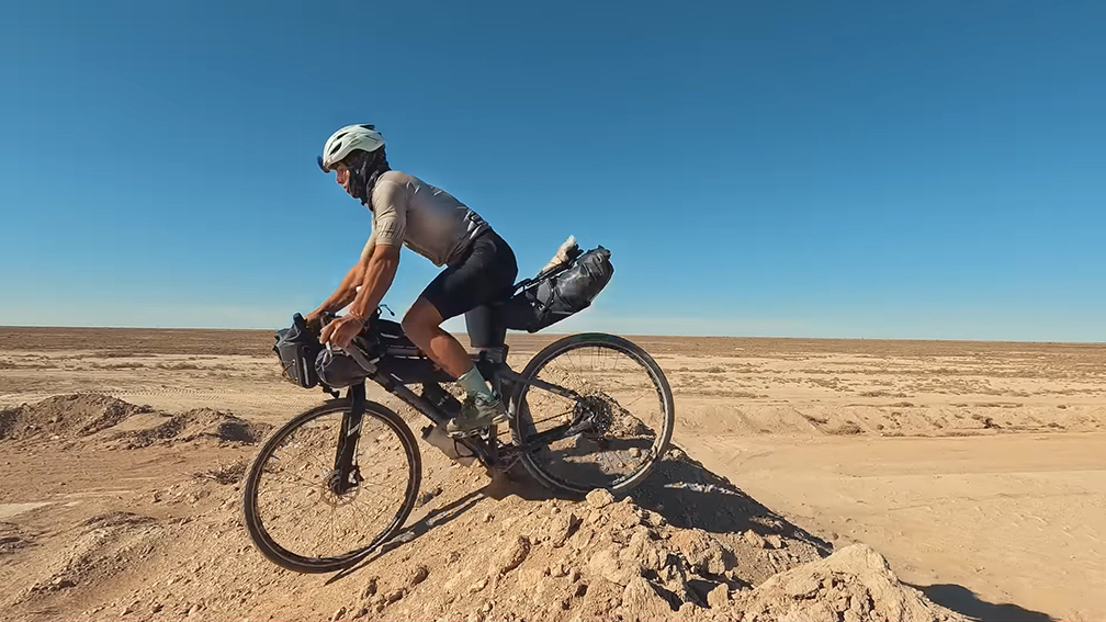 cyclist in desert