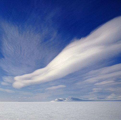 arctic island, snow and weird clouds
