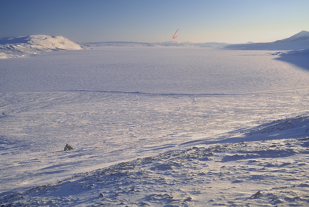 snowmobile and arctic scene