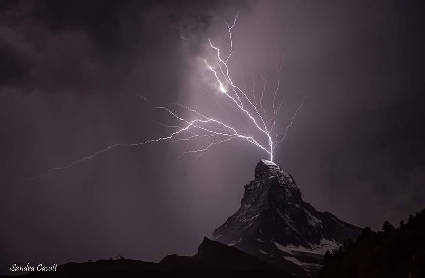 A lightning strike hitting the summit of Matterhorn during a fierce thunderstorm. 