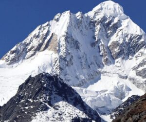 A snowy peak with a very steep face.