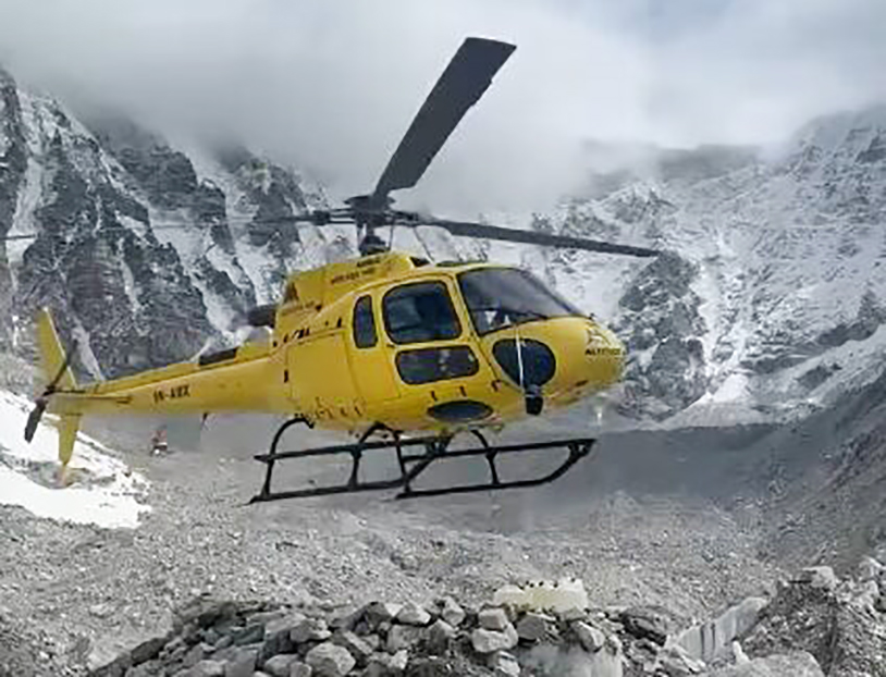 helicopter in an arid mountain scene