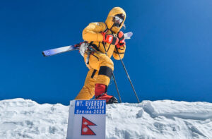 bartek Ziemski on the summit of Everest with skis on the backpack and no O2.