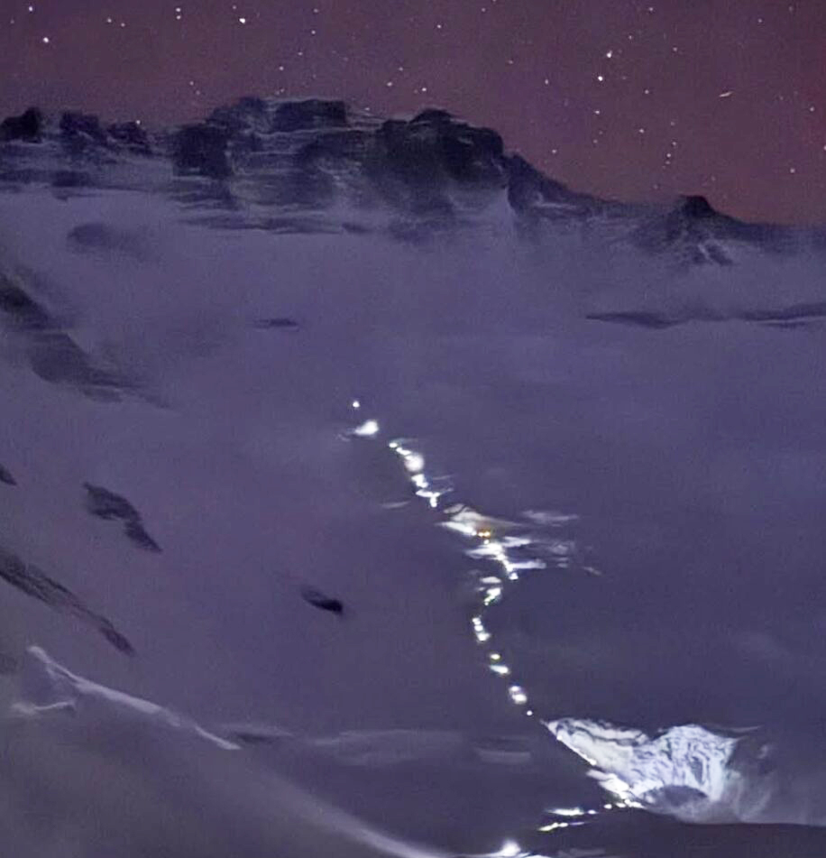 A line of Sherpas heading to Camp 4 in the dark on Everest.