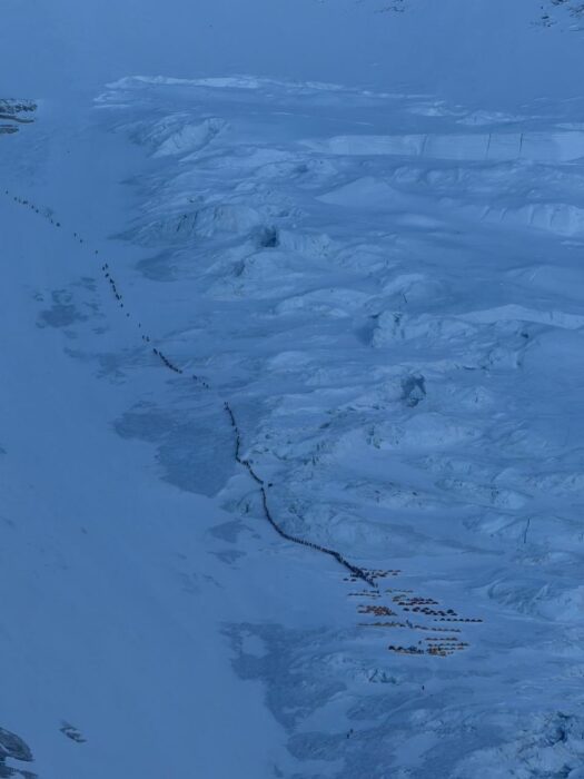 A line of climbers marking the route along the Lhotse Face towards Camp 4 on Everest. 