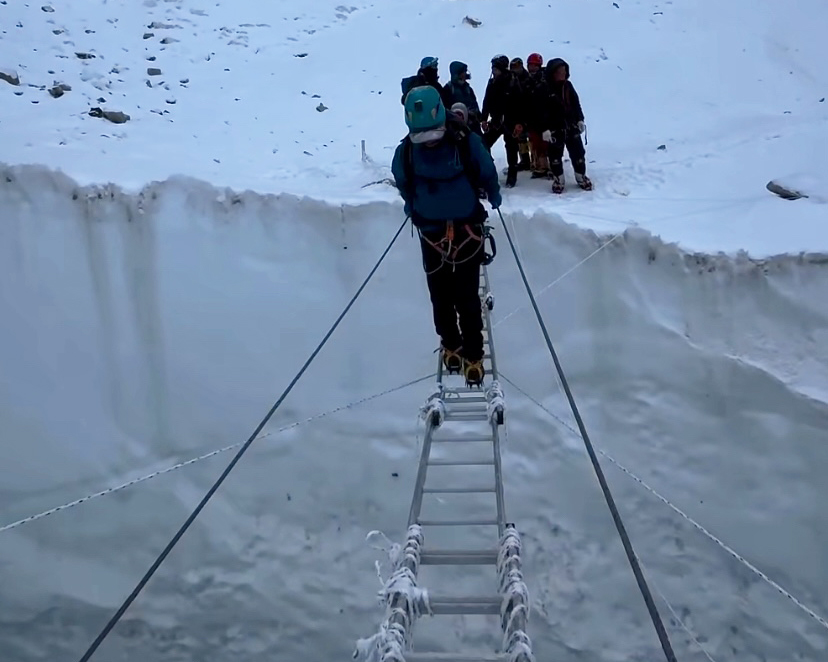 crossing ladders over a crevasse