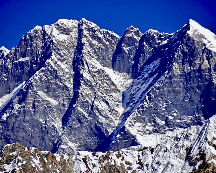 Everest and the gigantic South Face of Lhotse Main, Lhotse Middle, and Lhotse Shar from the upper Hongu Valley.