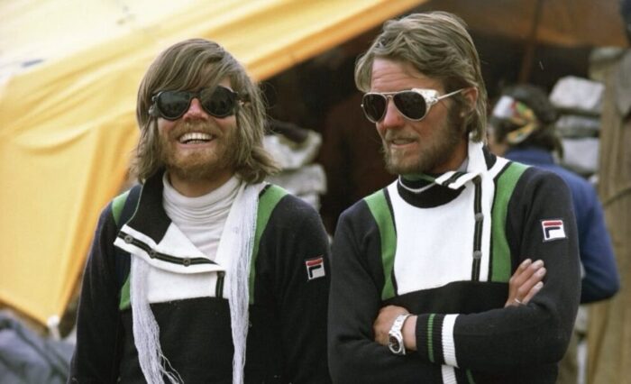 Messner and Habeler young and dressed on ski pullovers.