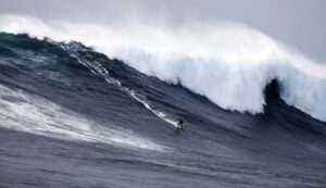 Grant “Twiggy” Baker, rides a massive wave at Cortes Bank.