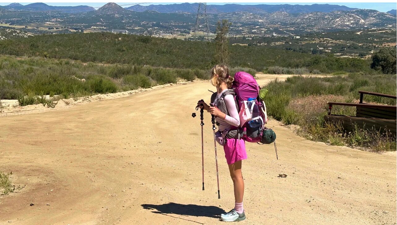 Kamryn Renae on the PCT with her pink pack and gear