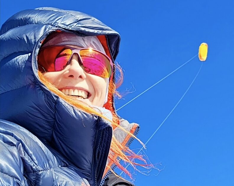 woman with sunglasses and red hair