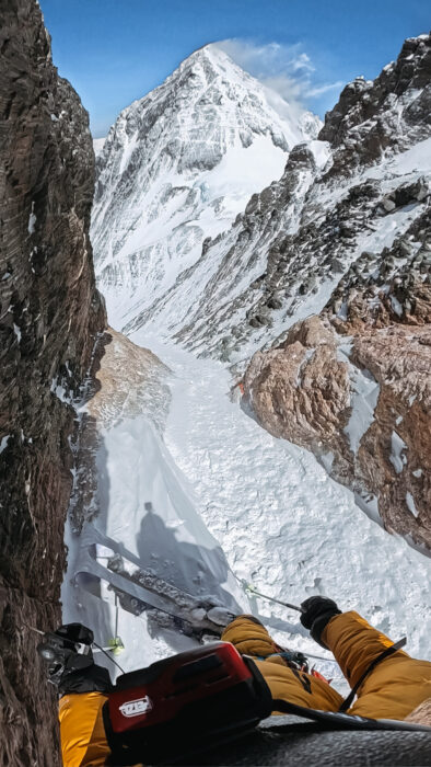 HoPro shot showing a skier shillouette on the Lhotse Couloir. 