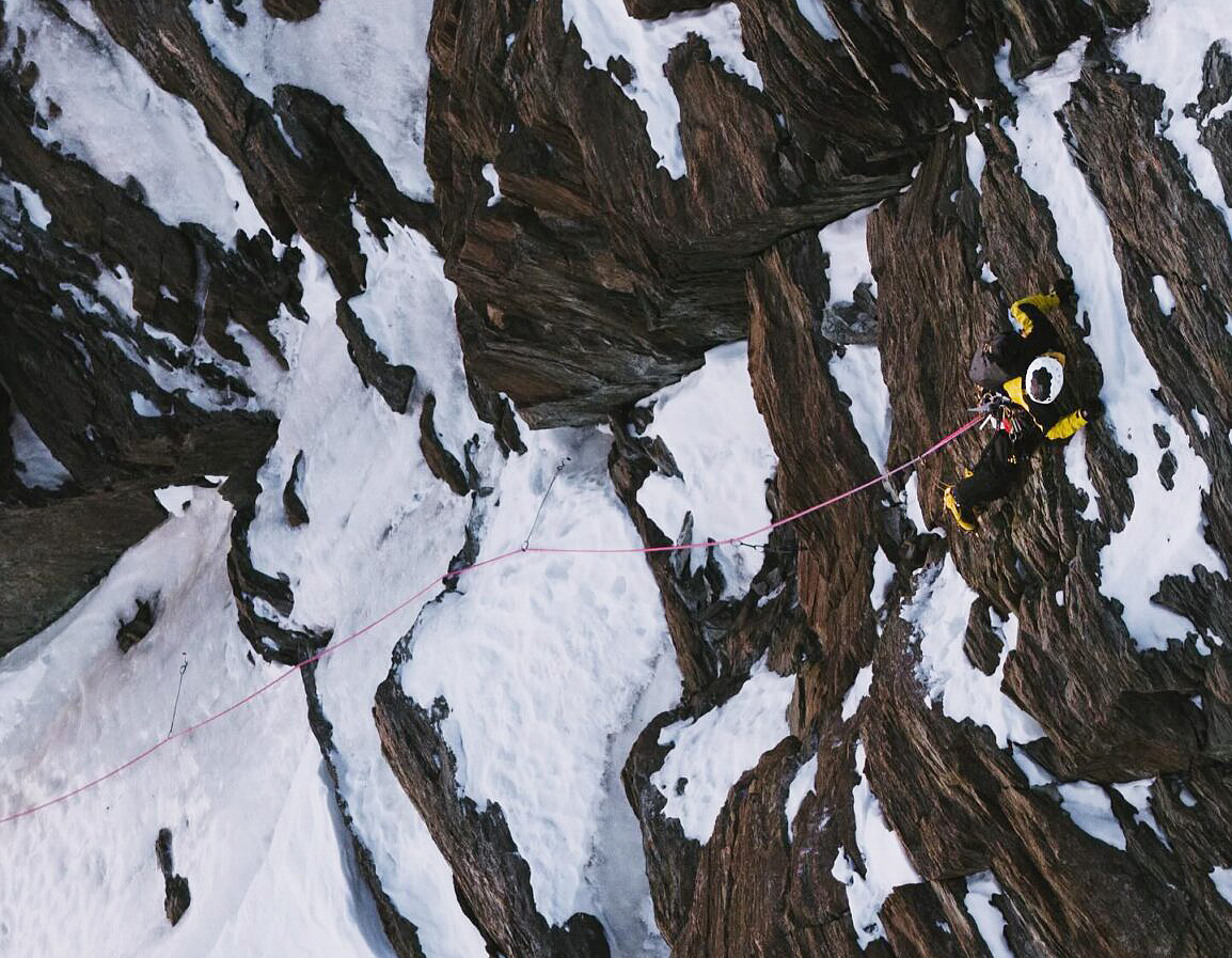 A climber on a mixed face.