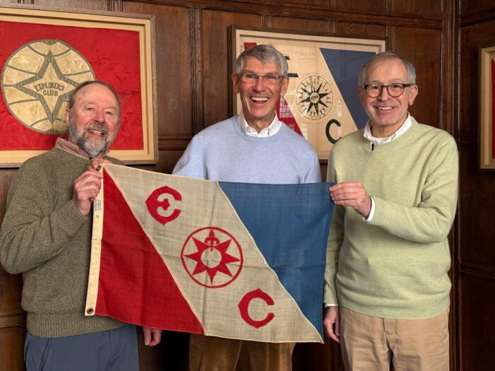 Adventurers Mike Beedell and Hubert Sagnieres receive flag #12 from the Explorers Club in New York, prior to their expedition in the Western Canadian Arctic