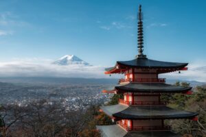 Mount Fuji and Chureito Pagoda at sunrise in autumn season.