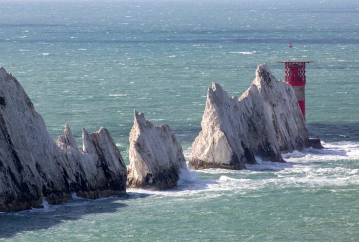 The aptly named "Needles" at the Western tip of the Isle of Wight in choppy seas.