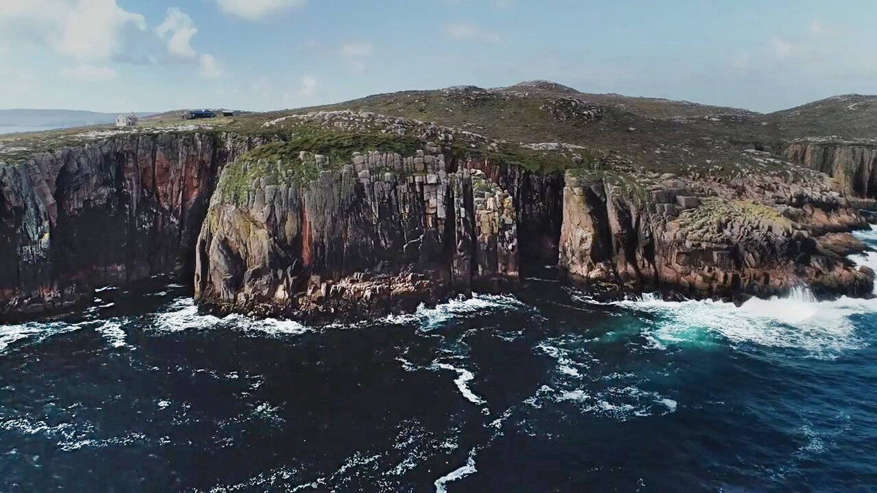 cliffs and lashing sea