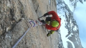 A man climbing a rock wall