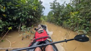 kayak on brown water river