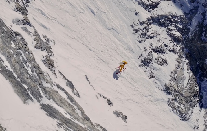 Frame of a video. Jim Morrison skiing down the impressive Super Direct route on Everest.