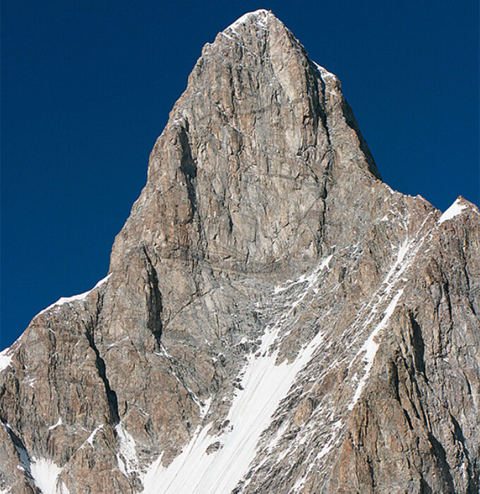 A jarakoram peak with a mighty rock face .