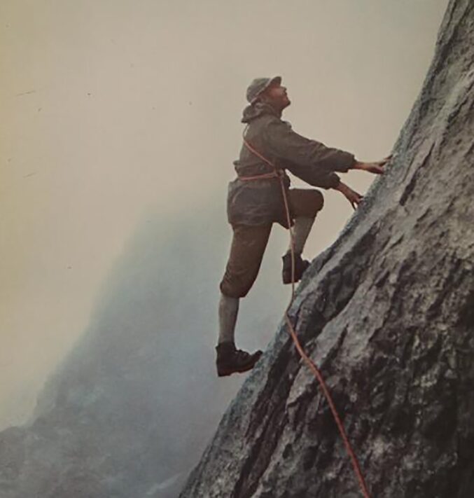 old pic of man climbing