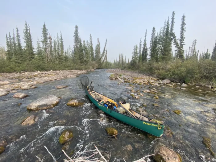 Canoe on a river in the north of Canada