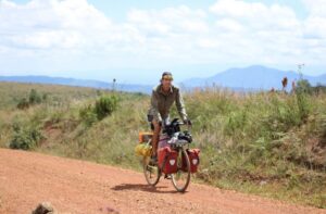 Ian Andersen cycling through Malawi in 2023.