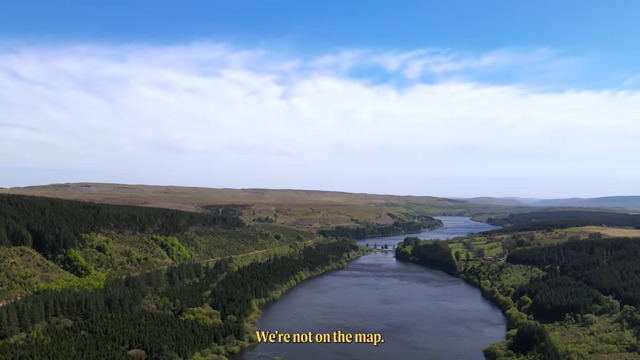 A river rolling gently through a picturesque British landscape