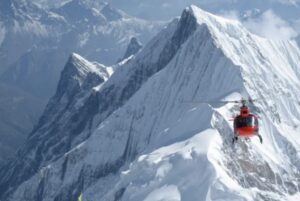 Swiss rescuers in action with their helicopter.
