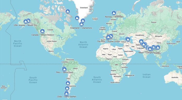 A world map with 50 dots locating mountains. 