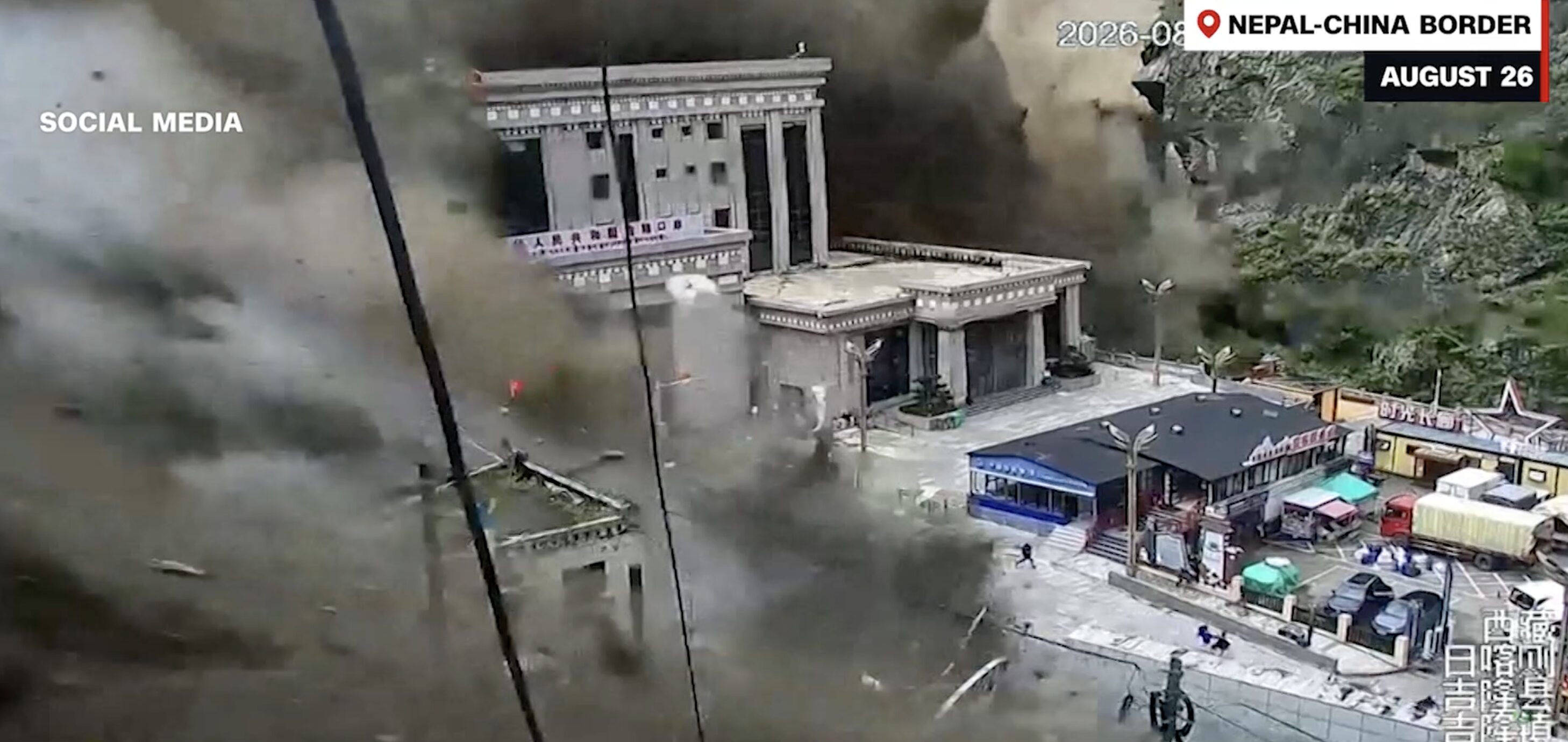 A screenshot of the flood hitting Jilong in Tibet.