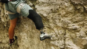 A Ukrainian veteran learns to rock climb at a crag in western Ukraine.