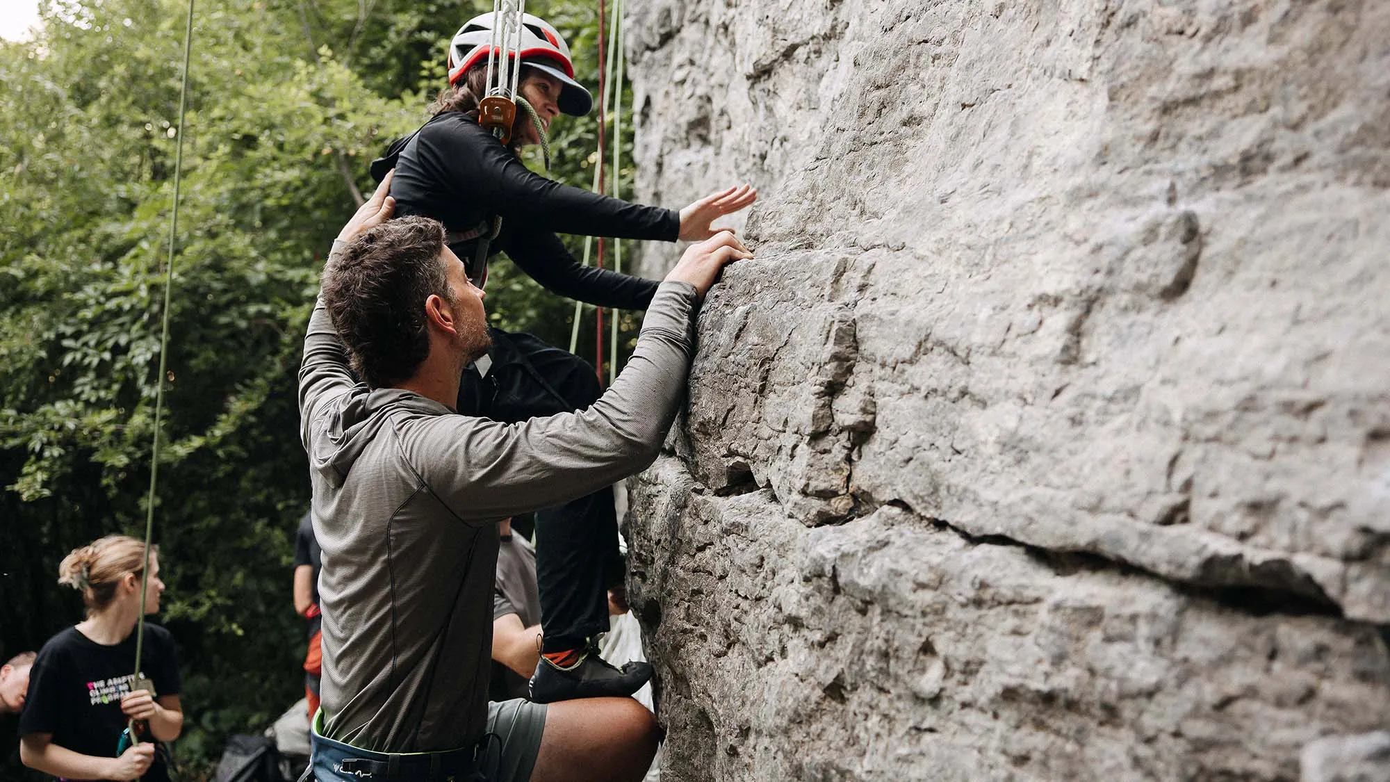 Climber son an outdoor crag