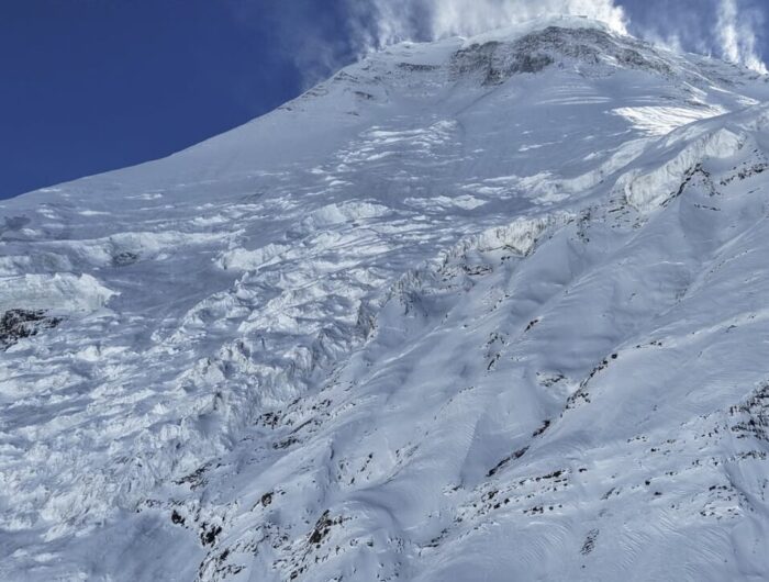 Dhaulagiri's upper sections loaded with snow and swept by high winds.