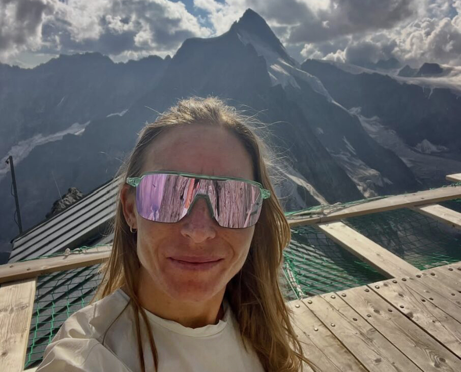 Selfie of Canadian trailrunner Kalie McCrystal with the shillouette of Matterhorn behind.