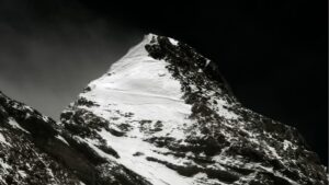Two men approach the summit of Everest