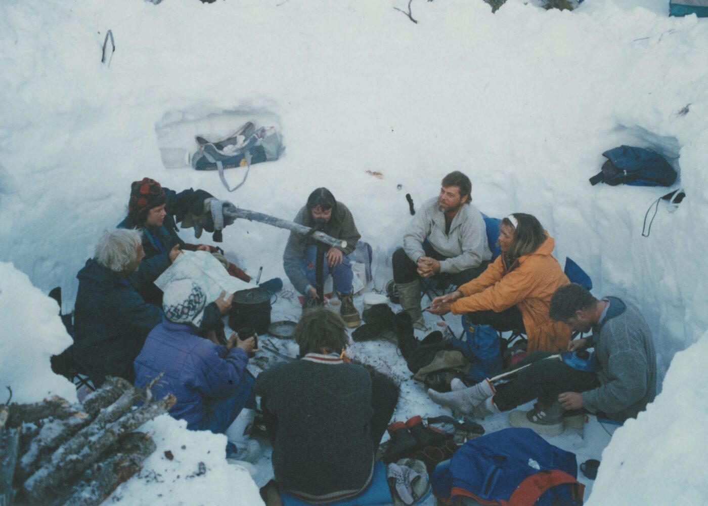 A deep fire pit in snow