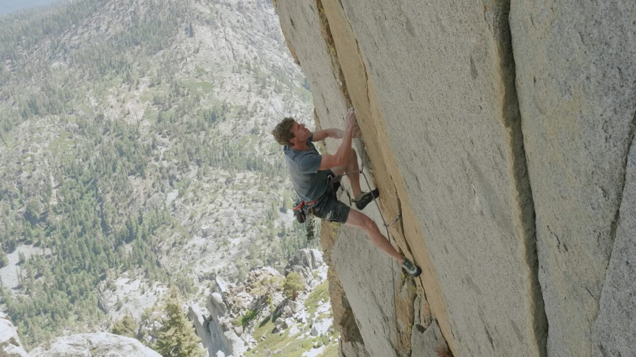 A man free climbing
