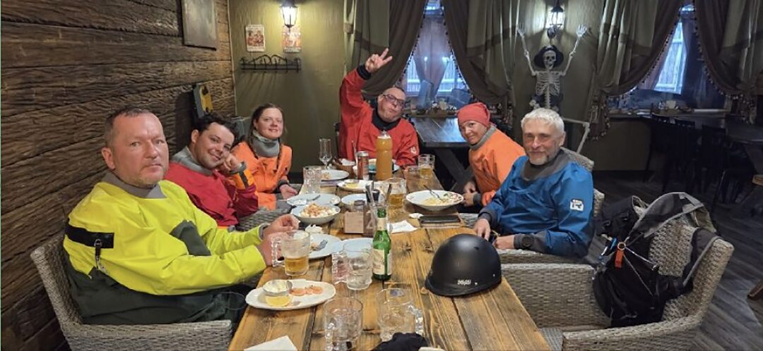 six paddlers at a large table