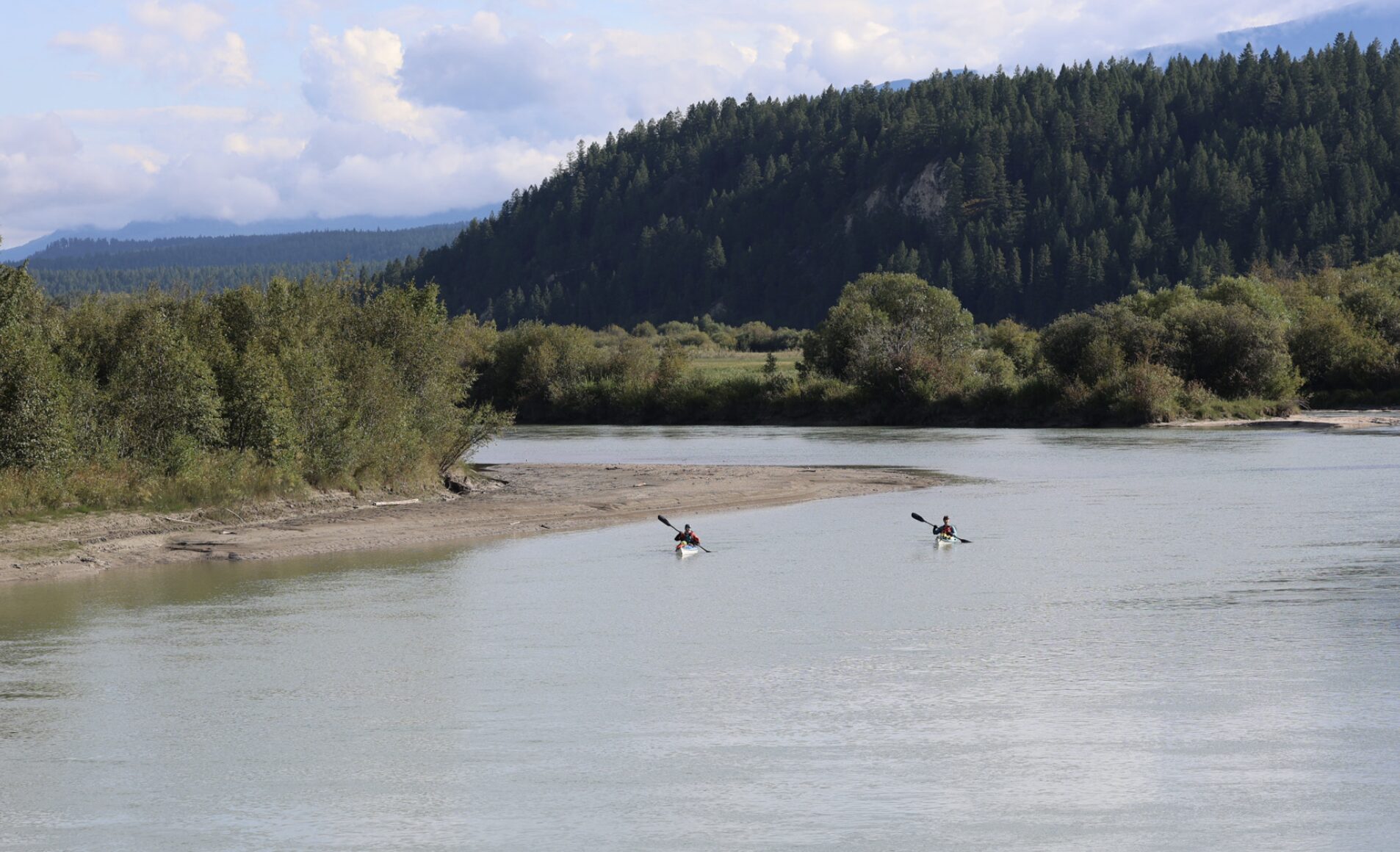 two small paddlers on a big river