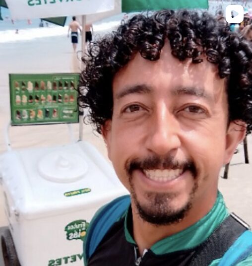 smiling curly headed guy