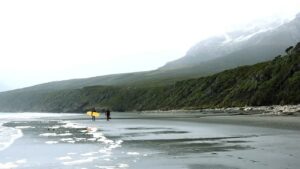Two surfers on a beach