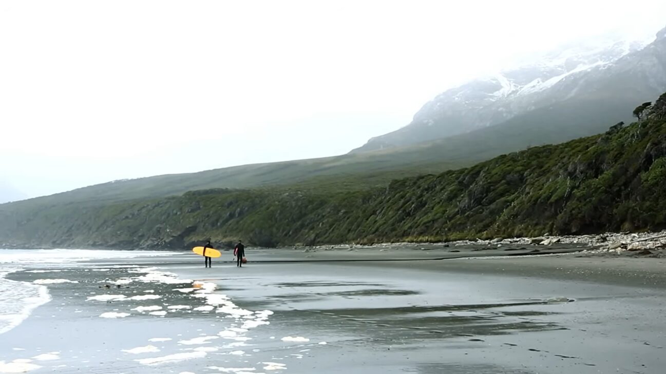 Two surfers on a beach