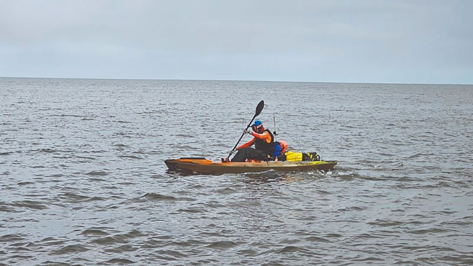 kayaker in featureless ocean