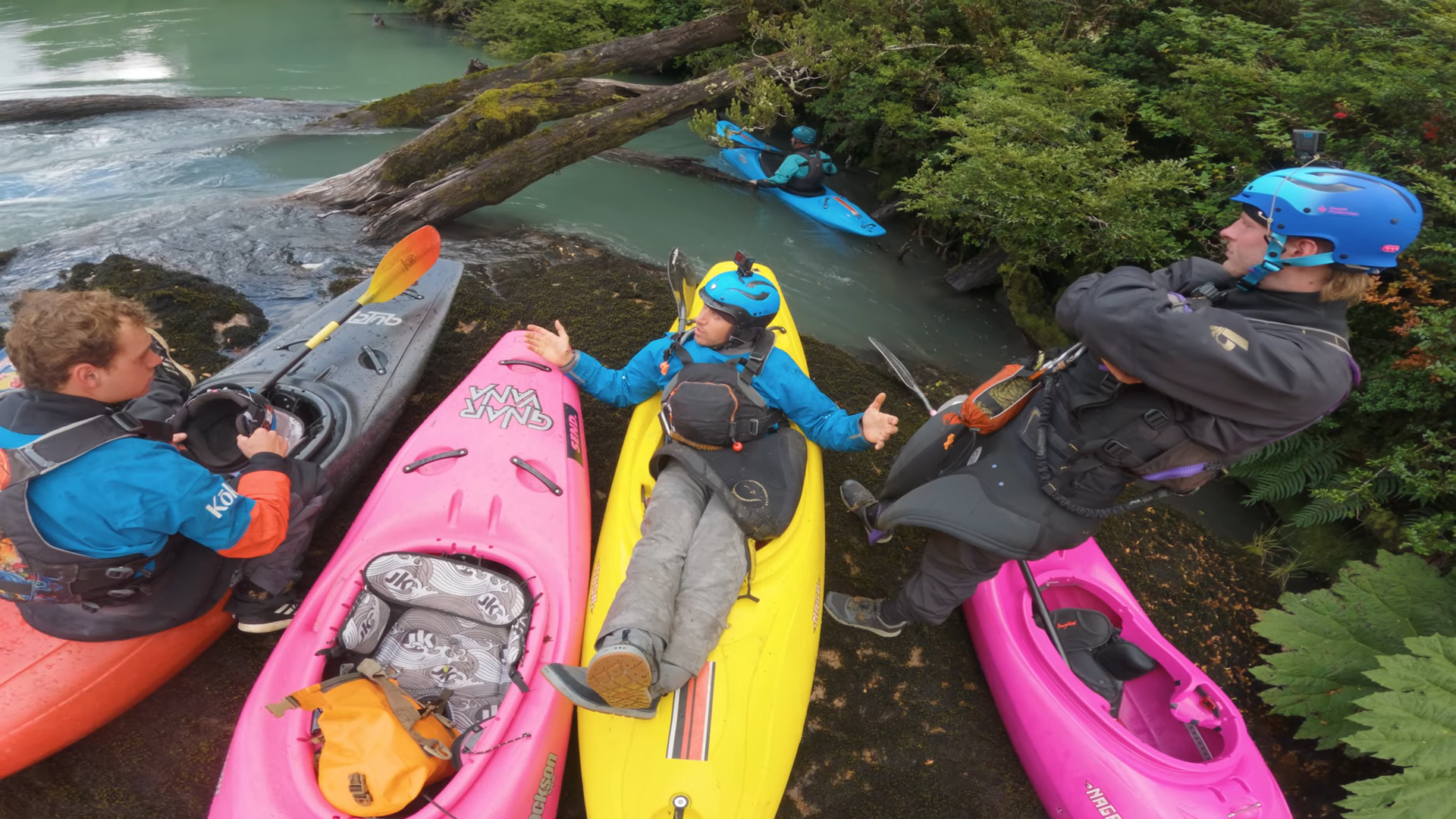 Several kayakers and a river
