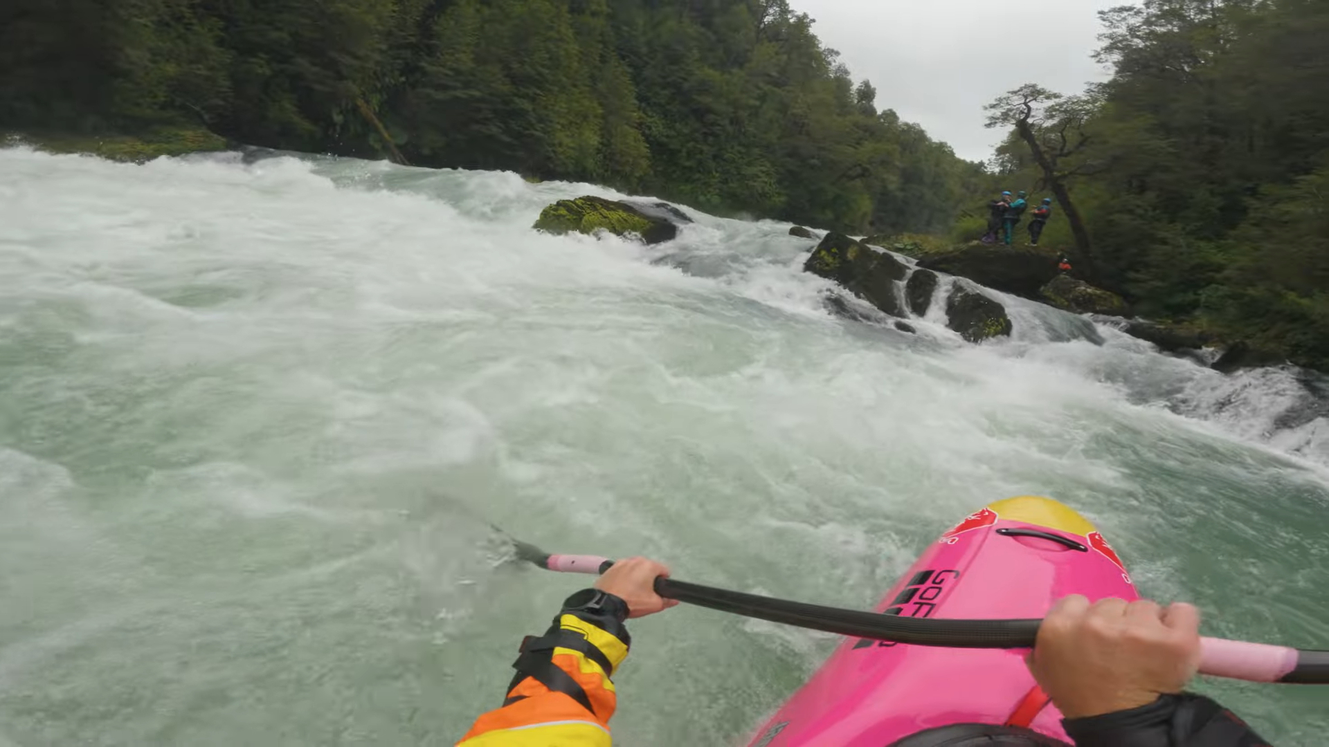 kayaker's perspective down whitewater river
