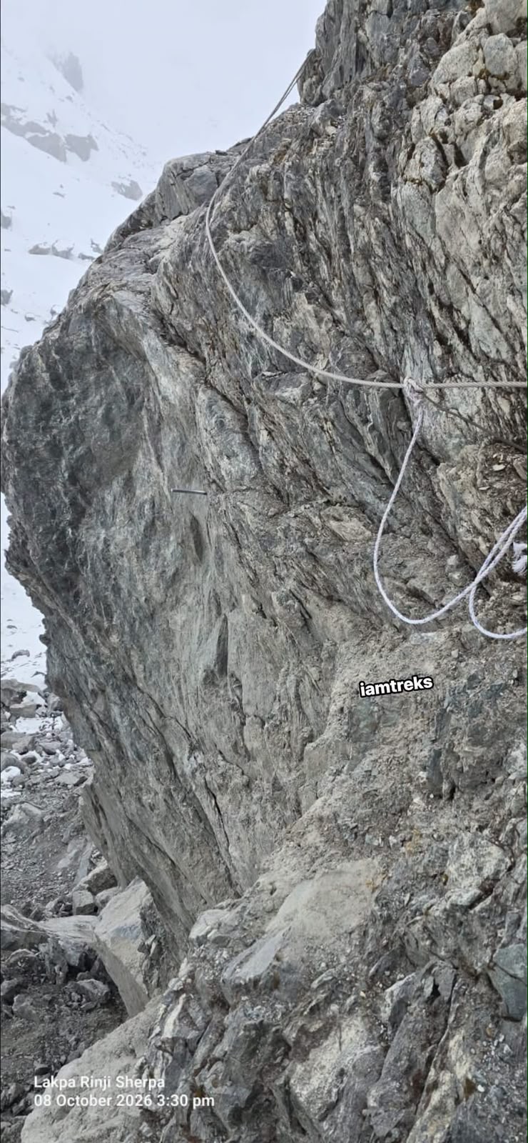 A rock traverse with fixed ropes. 