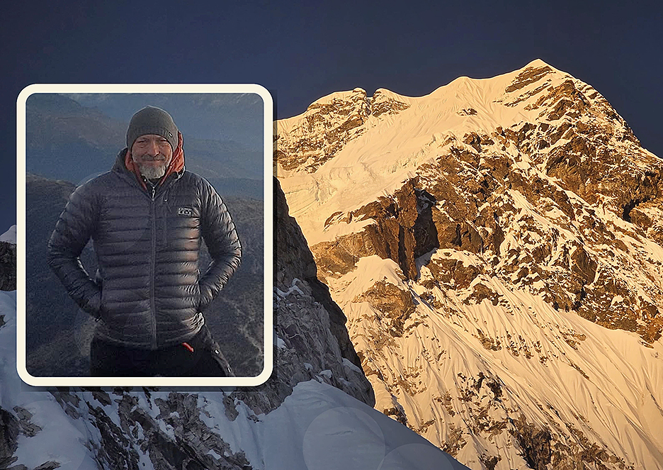 ama dablam with inset of climber